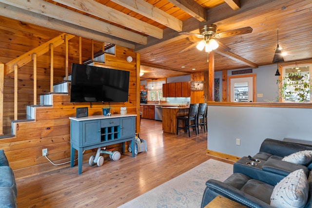 397 New Bridge Rd, Acton, ME 04001 - living area featuring wood ceiling, light wood finished floors, a ceiling fan, healthy amount of natural light, and stairway