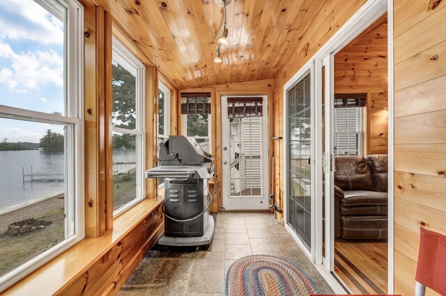 108 Sandy Beach Rd Unit 71, Glenburn, ME 04401 - sunroom with a water view, lofted ceiling, and wood ceiling