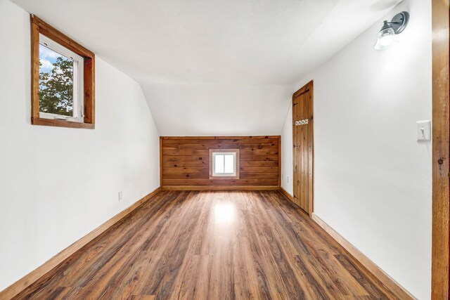 108 Sandy Beach Rd Unit 71, Glenburn, ME 04401 - bonus room with wood finished floors and lofted ceiling