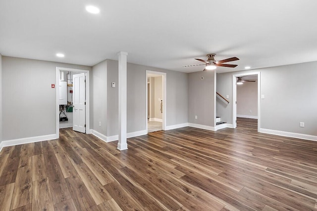 unfurnished living room featuring baseboards, recessed lighting, ceiling fan, and dark wood-style floors