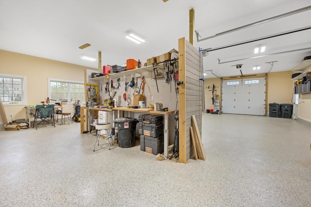 garage with a workshop area