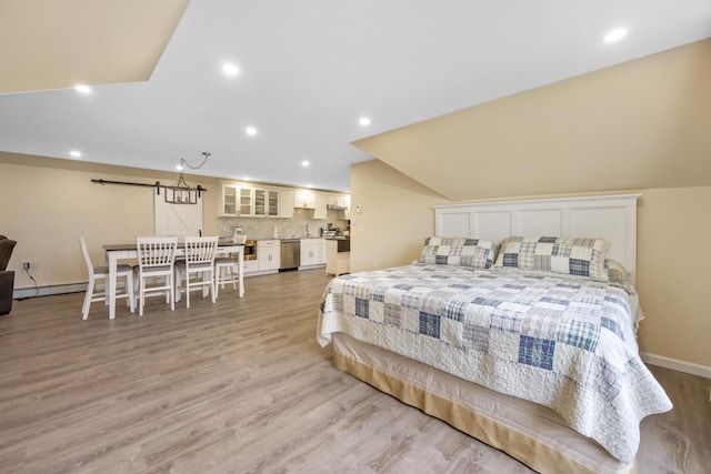 bedroom with a baseboard radiator, light wood-style floors, recessed lighting, and baseboards