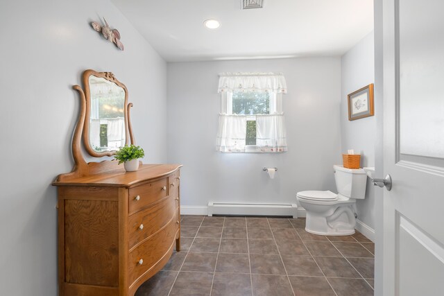 48 White Mountain Way, Bridgton, ME 04009 - bathroom featuring a baseboard radiator, tile patterned flooring, toilet, baseboards, and recessed lighting