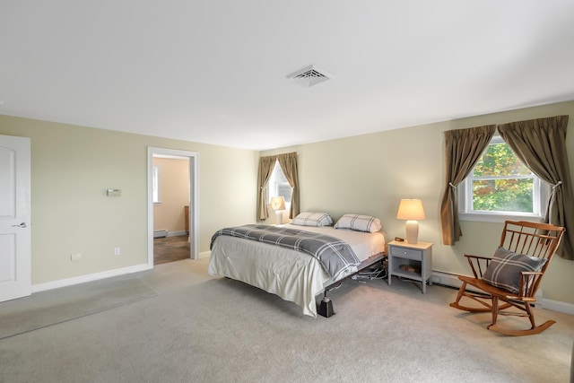 48 White Mountain Way, Bridgton, ME 04009 - bedroom featuring light carpet, baseboard heating, and baseboards