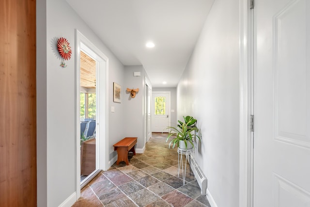48 White Mountain Way, Bridgton, ME 04009 - hallway with dark stone finish floors, a baseboard heating unit, baseboards, and recessed lighting