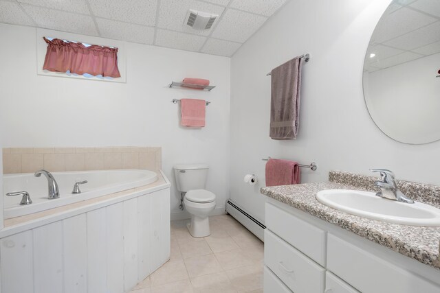 48 White Mountain Way, Bridgton, ME 04009 - bathroom with a baseboard heating unit, a paneled ceiling, tile patterned flooring, toilet, and vanity