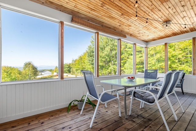48 White Mountain Way, Bridgton, ME 04009 - sunroom / solarium featuring outdoor dining space