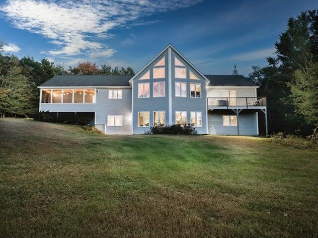 48 White Mountain Way, Bridgton, ME 04009 - back of house with a lawn