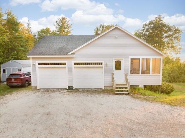 48 White Mountain Way, Bridgton, ME 04009 - view of front of house featuring a shingled roof