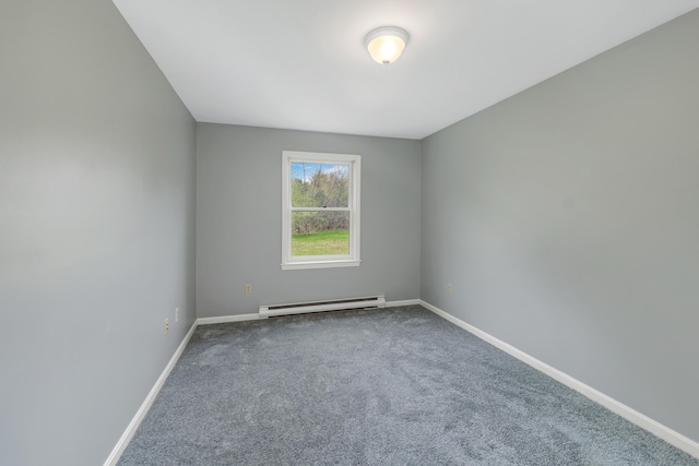 carpeted spare room with baseboards and baseboard heating