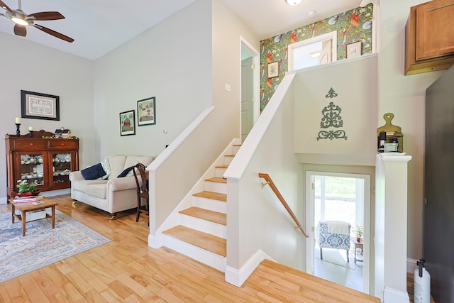 8 Codys Way, Bridgton, ME 04009 - stairway with ceiling fan, wood finished floors, and baseboards