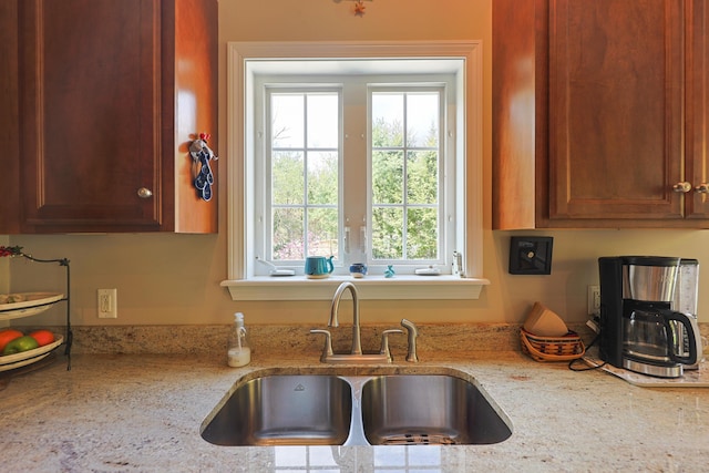 8 Codys Way, Bridgton, ME 04009 - kitchen featuring a sink, healthy amount of natural light, and light stone countertops