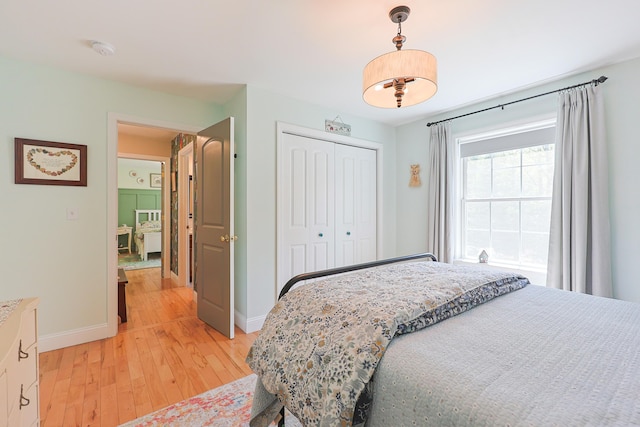 8 Codys Way, Bridgton, ME 04009 - bedroom featuring light wood-style floors, baseboards, and a closet