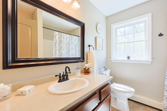 8 Codys Way, Bridgton, ME 04009 - full bathroom featuring a baseboard radiator, vanity, toilet, and tile patterned flooring