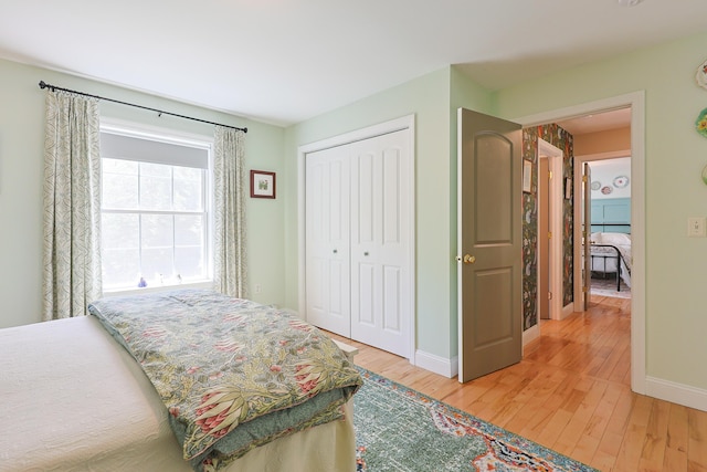 8 Codys Way, Bridgton, ME 04009 - bedroom with light wood finished floors, baseboards, and a closet