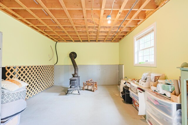 8 Codys Way, Bridgton, ME 04009 - below grade area featuring a wood stove