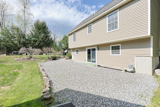 8 Codys Way, Bridgton, ME 04009 - rear view of house featuring a yard