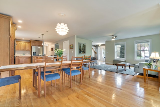 dining space with stairway, light wood-style floors, ceiling fan, and recessed lighting
