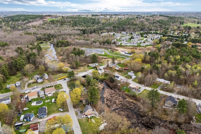 aerial overview of property's location featuring nearby suburban area