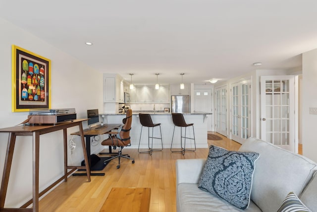 709 Chandlers Wharf Unit 709, Portland, ME 04101 - living area with light wood finished floors and recessed lighting
