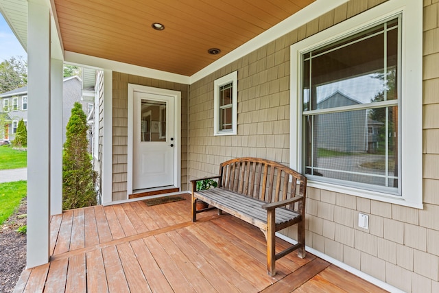 entrance to property featuring a porch