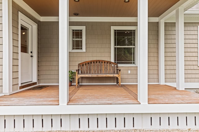 wooden terrace featuring a porch