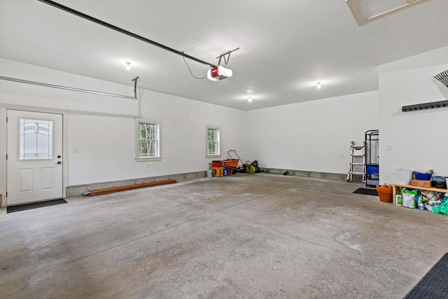 garage featuring a garage door opener