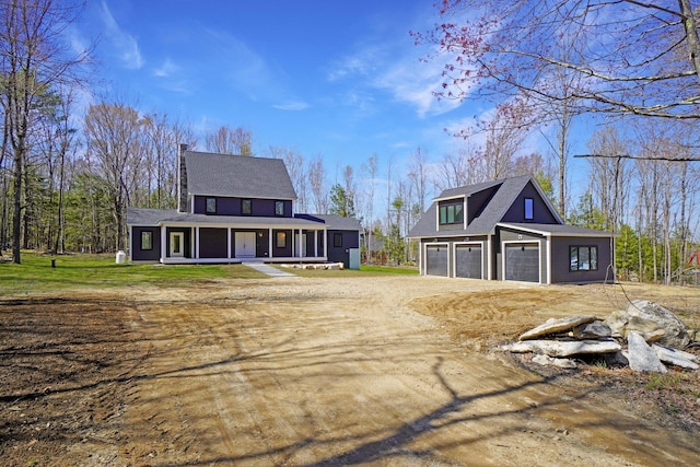 15 County Xing, Brunswick, ME 04011 - view of front of property featuring driveway, a shingled roof, covered porch, and an attached garage