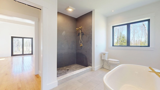 15 County Xing, Brunswick, ME 04011 - full bathroom featuring plenty of natural light, toilet, a tile shower, and a freestanding tub