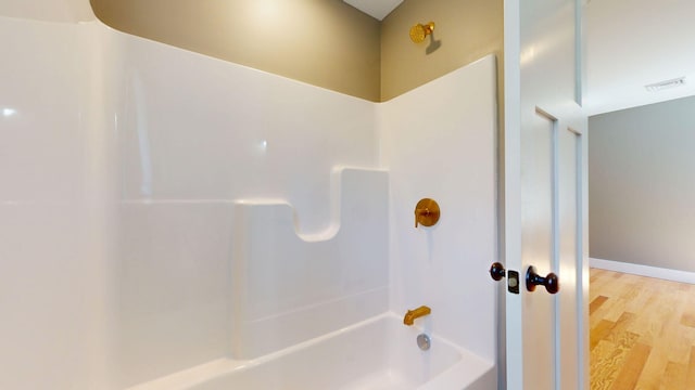 15 County Xing, Brunswick, ME 04011 - full bathroom featuring baseboards, visible vents, and wood finished floors