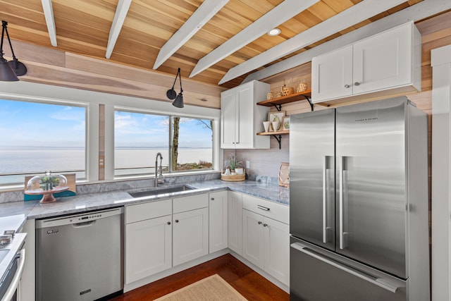 79 Snug Harbor Rd, Standish, ME 04084 - kitchen with stainless steel appliances, a sink, open shelves, wooden ceiling, and white cabinetry