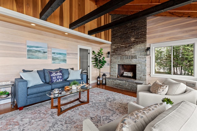 79 Snug Harbor Rd, Standish, ME 04084 - living room with wooden walls, wood finished floors, high vaulted ceiling, a fireplace, and beamed ceiling