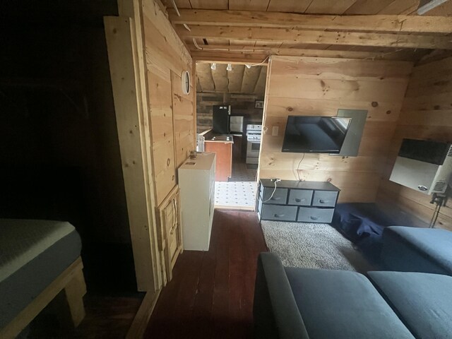 51 Pond Rd, Bradford, ME 04410 - living room featuring wooden walls, dark wood finished floors, and wooden ceiling