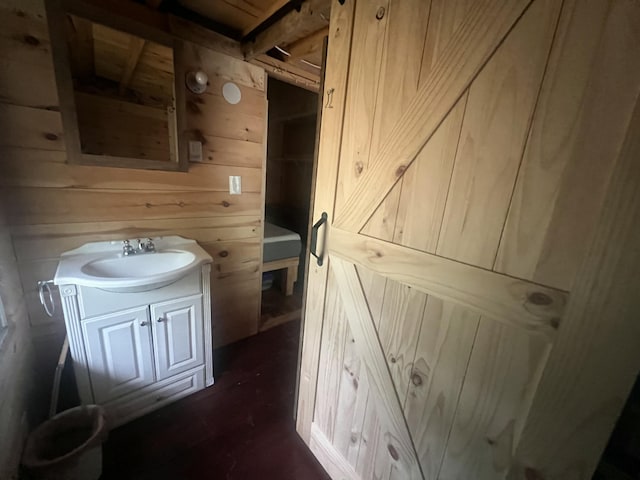 51 Pond Rd, Bradford, ME 04410 - bathroom featuring wooden walls and vanity