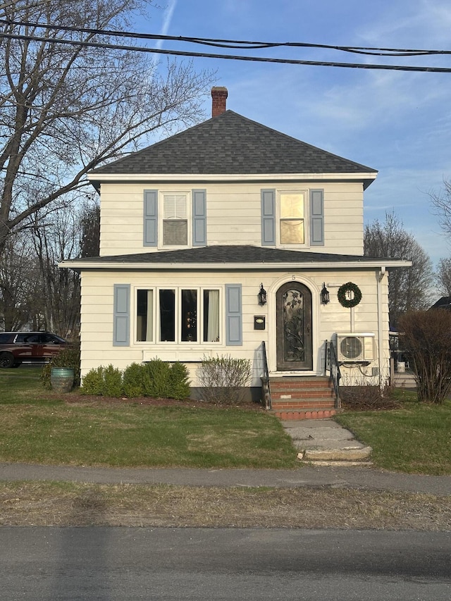 5 Cone St, East Millinocket, ME 04430 - traditional home featuring a chimney, a shingled roof, and a front lawn