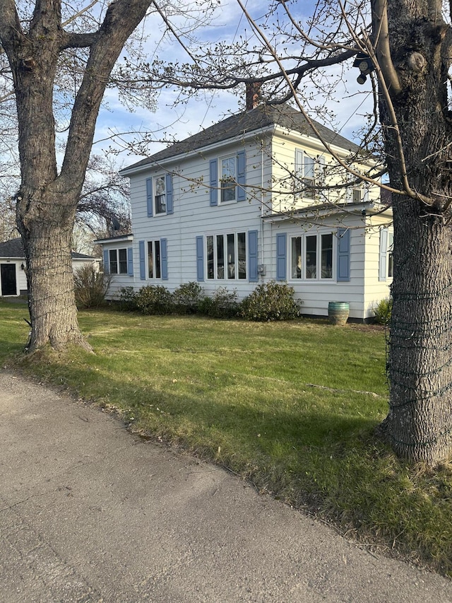 5 Cone St, East Millinocket, ME 04430 - colonial house with a chimney and a front lawn