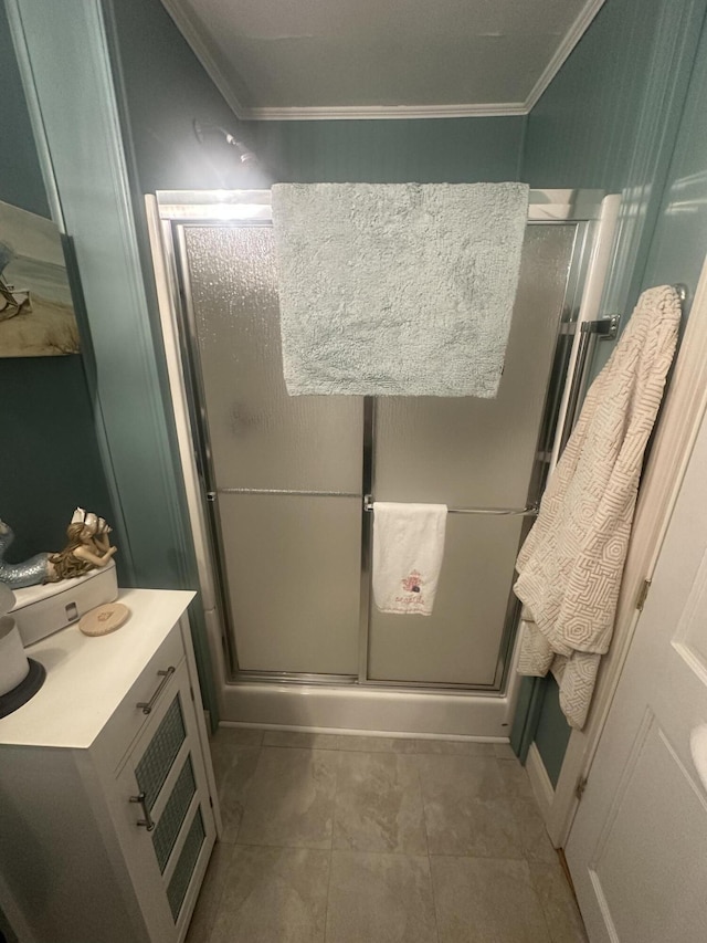 5 Cone St, East Millinocket, ME 04430 - bathroom featuring a shower stall, crown molding, and tile patterned flooring