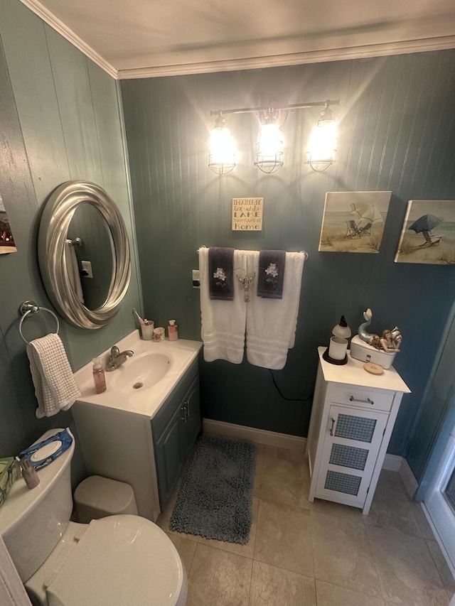 5 Cone St, East Millinocket, ME 04430 - bathroom with toilet, ornamental molding, tile patterned flooring, wood walls, and vanity