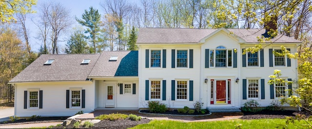 196 Eaton Ridge Dr, Holden, ME 04429 - colonial home featuring a chimney and roof with shingles