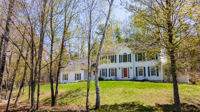 196 Eaton Ridge Dr, Holden, ME 04429 - colonial house featuring a front lawn