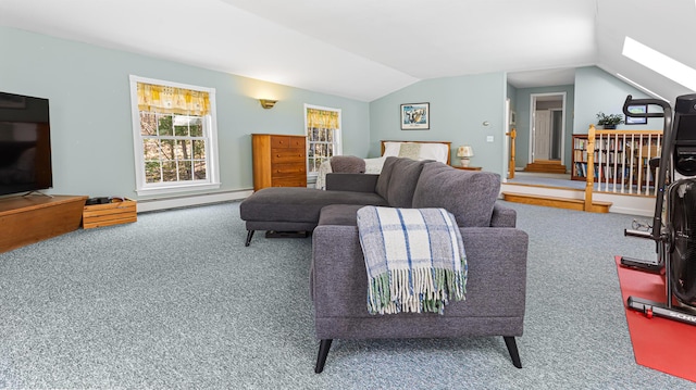 196 Eaton Ridge Dr, Holden, ME 04429 - living room with a baseboard radiator, carpet flooring, lofted ceiling, and a skylight