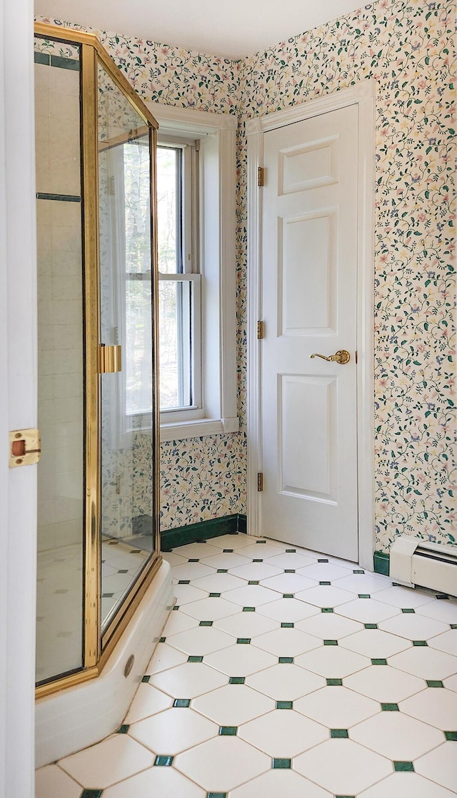 196 Eaton Ridge Dr, Holden, ME 04429 - unfurnished room featuring wallpapered walls and a baseboard radiator