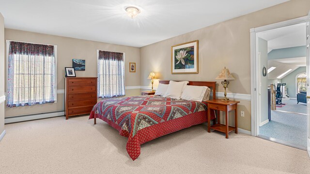 196 Eaton Ridge Dr, Holden, ME 04429 - carpeted bedroom with a baseboard heating unit and baseboards