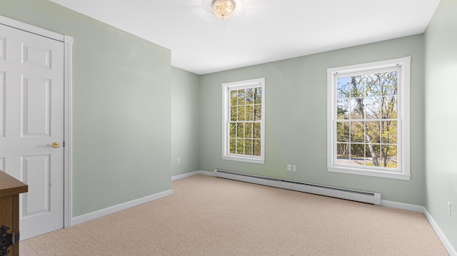 196 Eaton Ridge Dr, Holden, ME 04429 - carpeted spare room featuring a baseboard heating unit, healthy amount of natural light, and baseboards