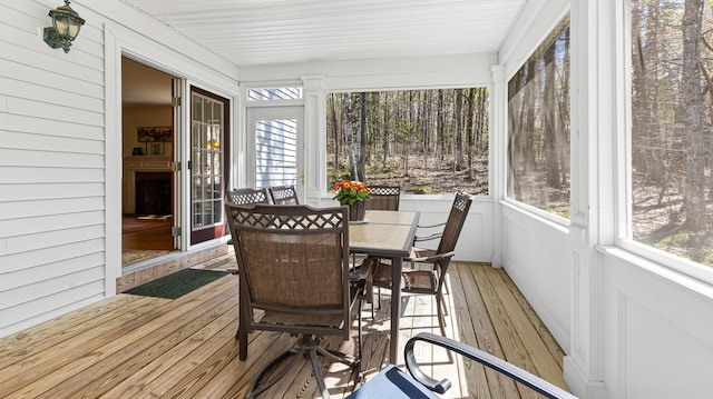 196 Eaton Ridge Dr, Holden, ME 04429 - sunroom featuring hardwood / wood-style floors, plenty of natural light, and outdoor dining area