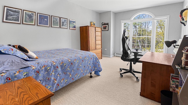 196 Eaton Ridge Dr, Holden, ME 04429 - bedroom with carpet floors, a desk, baseboard heating, and baseboards