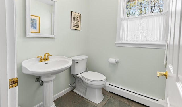 196 Eaton Ridge Dr, Holden, ME 04429 - bathroom featuring a baseboard heating unit, toilet, and baseboards