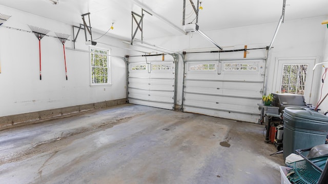 196 Eaton Ridge Dr, Holden, ME 04429 - garage featuring a garage door opener