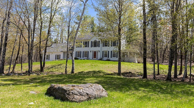 196 Eaton Ridge Dr, Holden, ME 04429 - colonial home featuring a front lawn