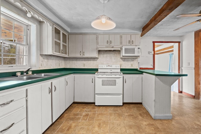 20 Crystal Spring Ln, Rome, ME 04963 - kitchen with white appliances, under cabinet range hood, a sink, beamed ceiling, and hanging light fixtures